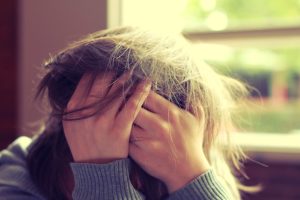 Stressful woman losing motivation for weight loss