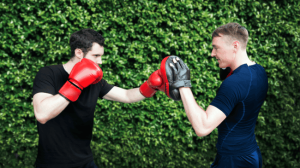 Two men practicing boxing