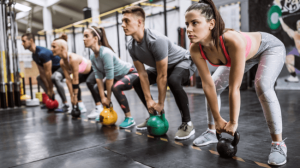 teens lifting kettlebells