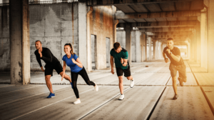 A group of people working out in an isolated building