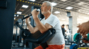 An old man doing strength training