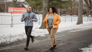 A black couple jogs